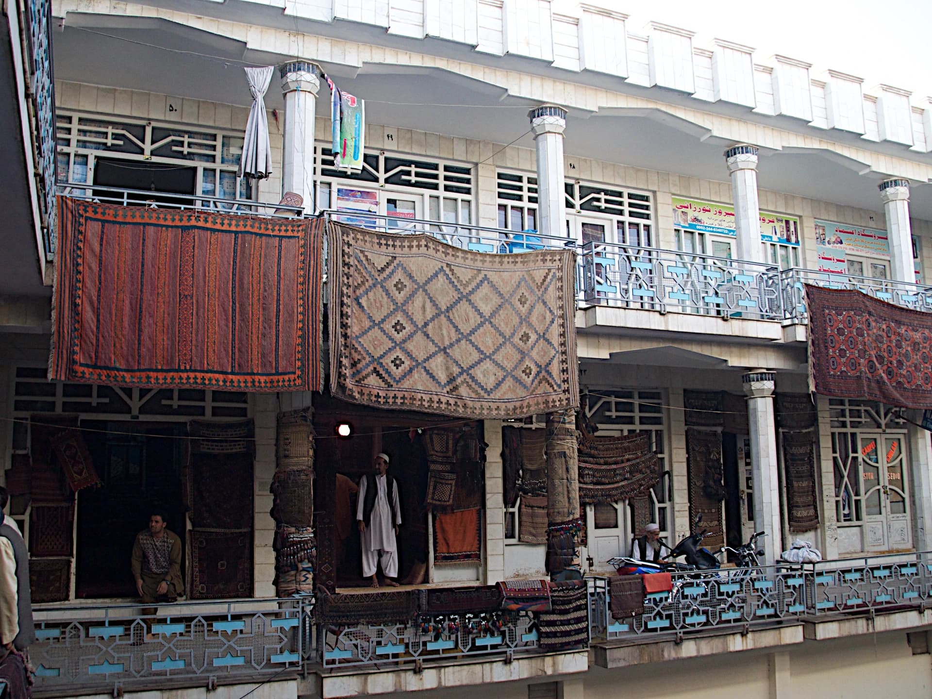 Carpet shops and textile displays in the bazaar of Herat, Afghanistan