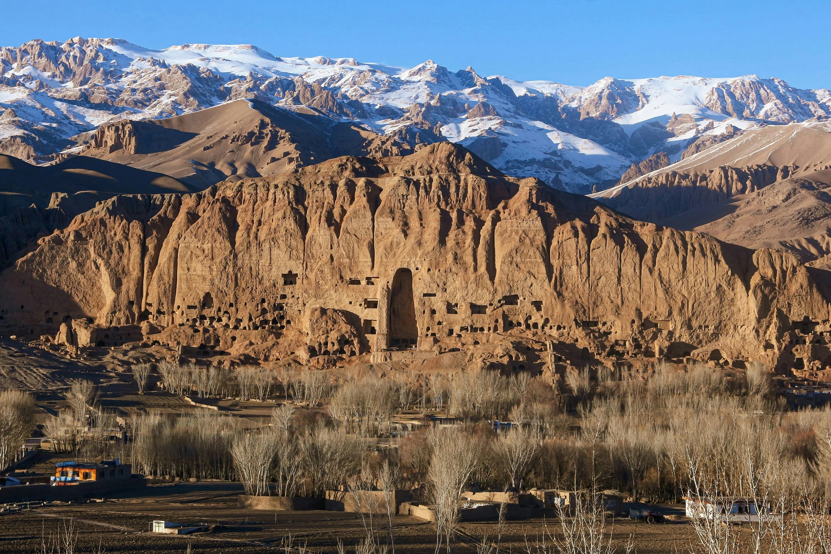 Bamyan’s historic cliffs beneath snow-capped mountains