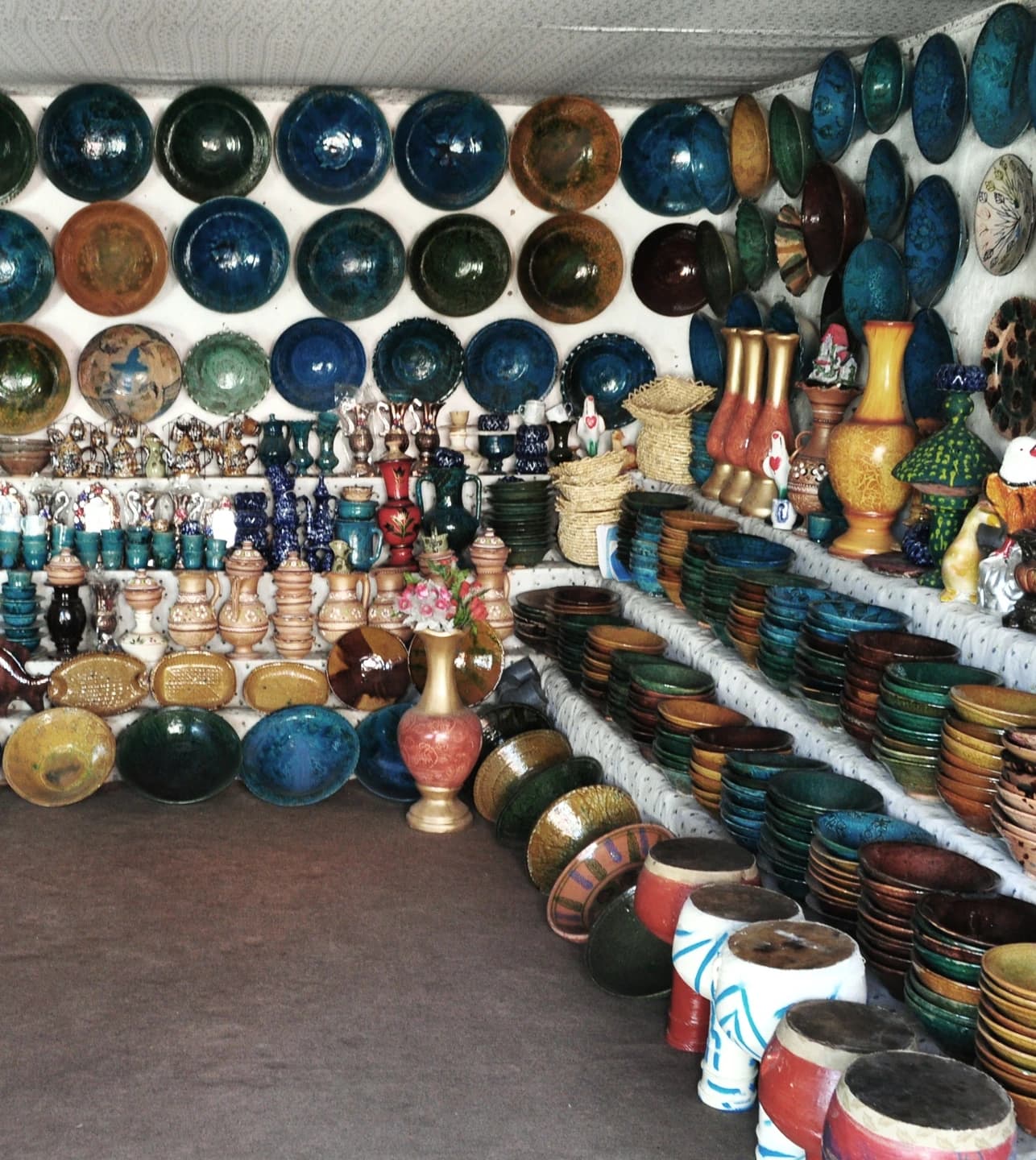 Glazed plates and vessels in an Istalif pottery shop, Afghanistan
