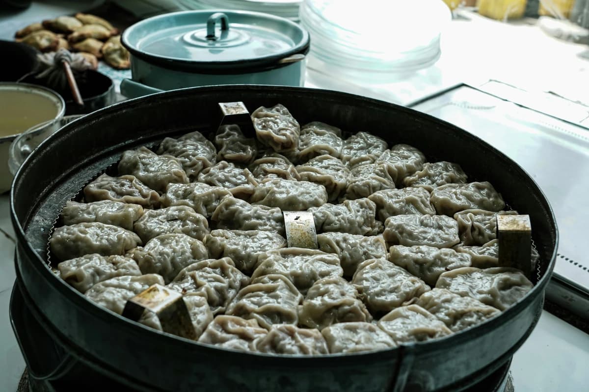 Afghan mantu dumplings arranged for steaming