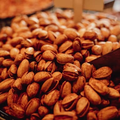 Pistachios piled in a market bowl