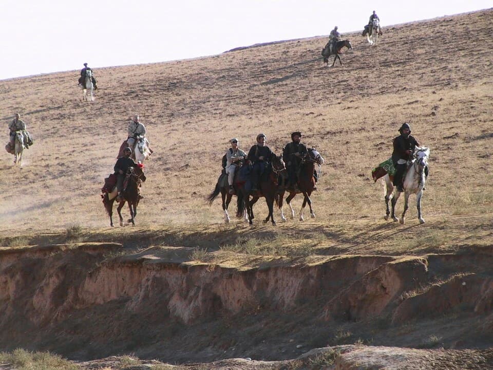 US Special Forces travelling on horseback in Afghanistan, 2001