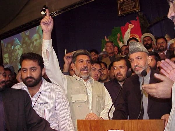 Hamid Karzai surrounded by supporters after his election at the 2002 Loya Jirga