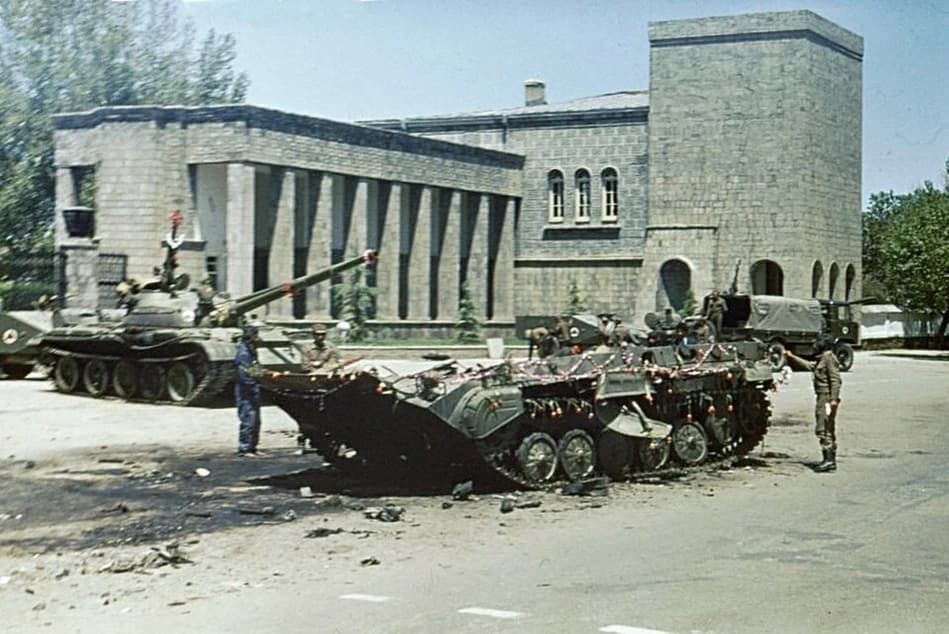 Armoured vehicles outside the presidential palace after the Saur Revolution, 1978