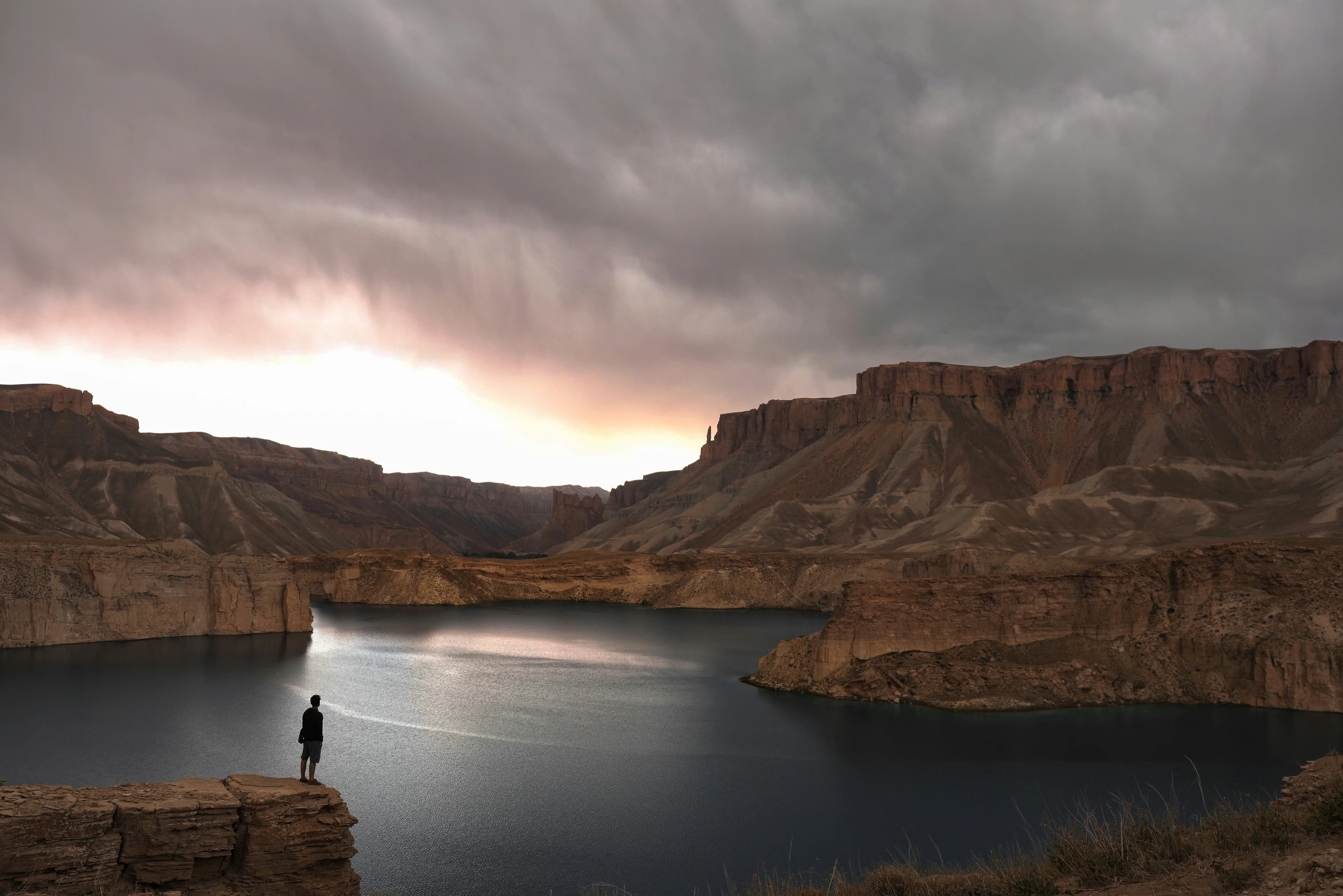 Evening light across the blue lakes and cliffs of Band-e-Amir