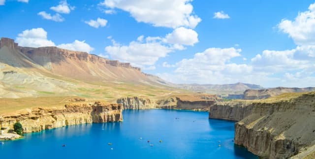 Band-e-Amir lakes beneath a blue mountain sky