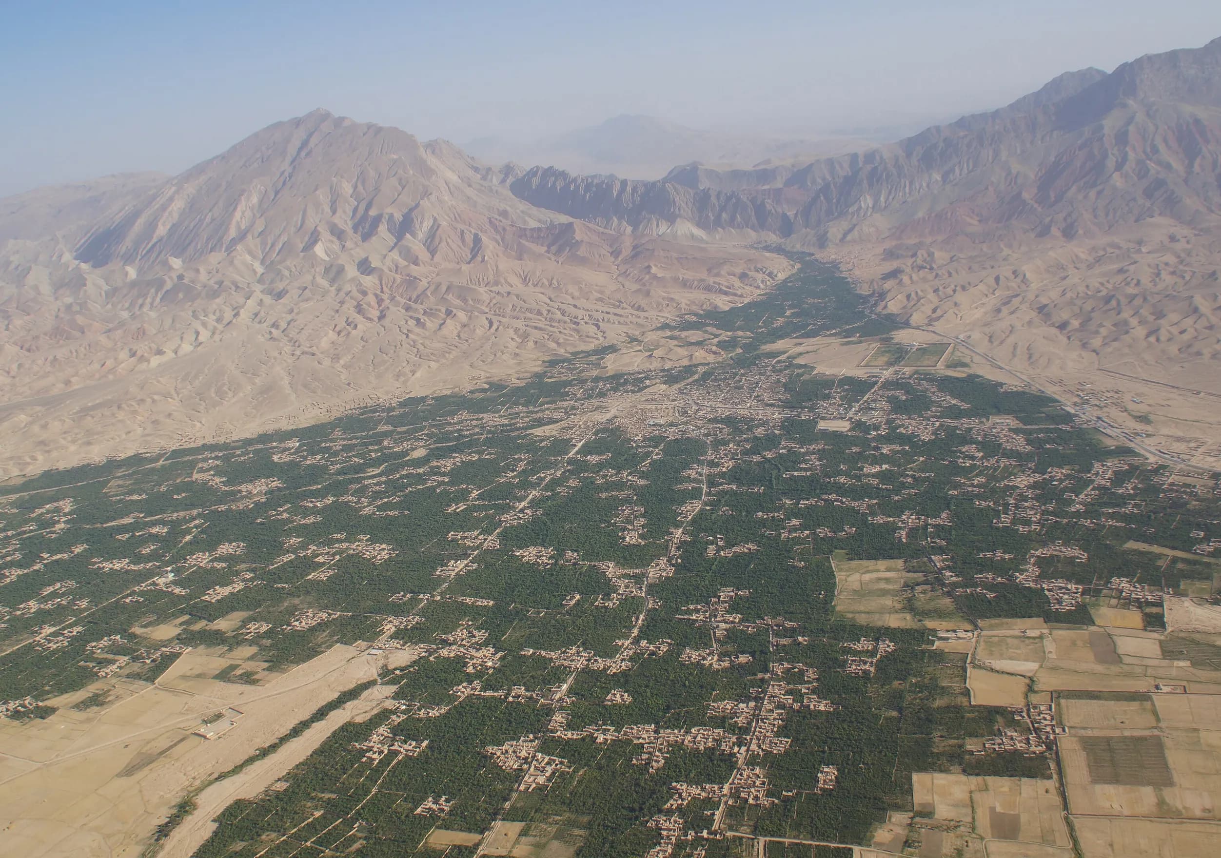 The green orchards of Khulm seen from the air, Balkh