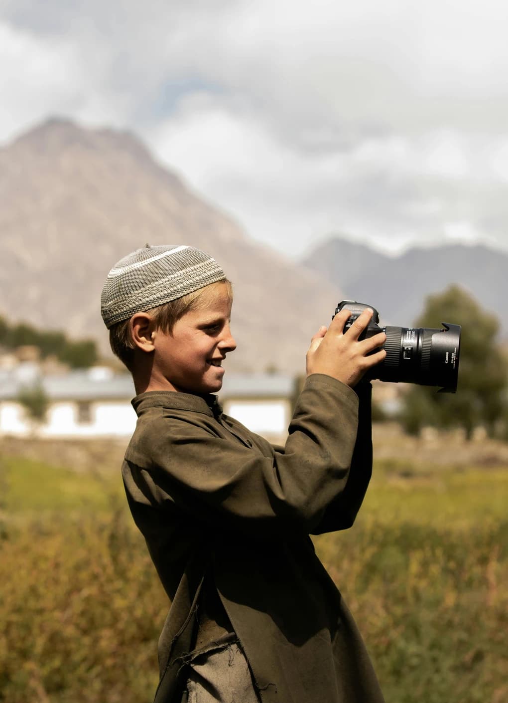 An Afghan photographer with his camera