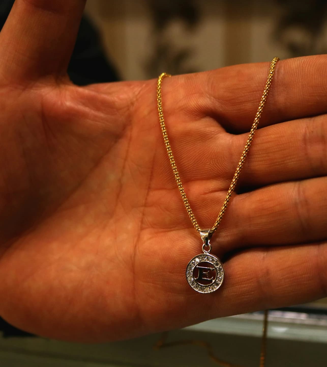 A handcrafted silver necklace photographed in Herat, Afghanistan