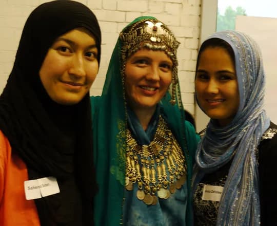 A woman in traditional dress with a jewelled headdress at Bamiyarra, a Hazaragi culture evening in Melbourne