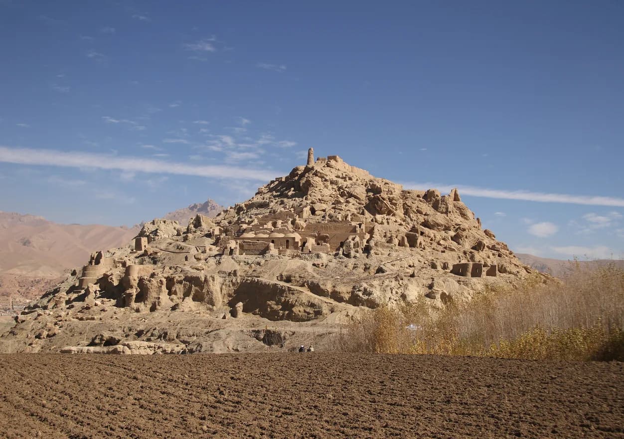 The ruins of Shahr-e Gholghola on its hill in the Bamiyan Valley