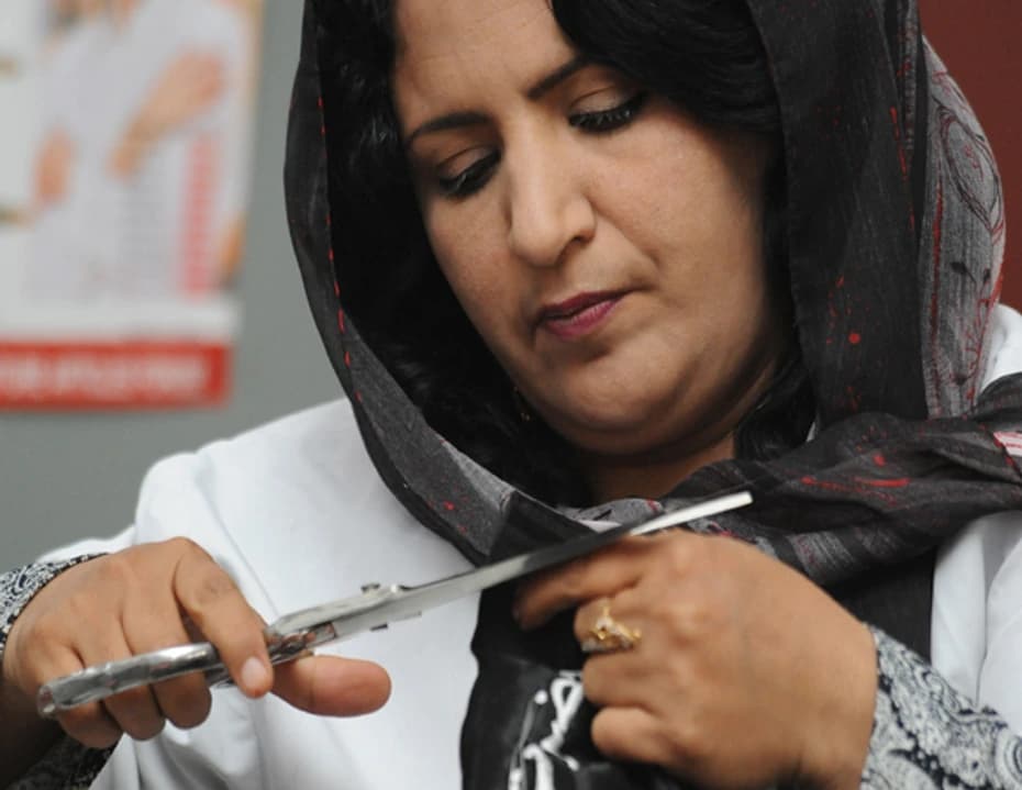 Habiba, a seamstress at work in a Kabul sewing workshop