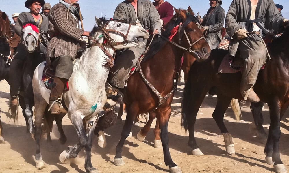 Horsemen at a Nowruz buzkashi match in Mazar-e-Sharif