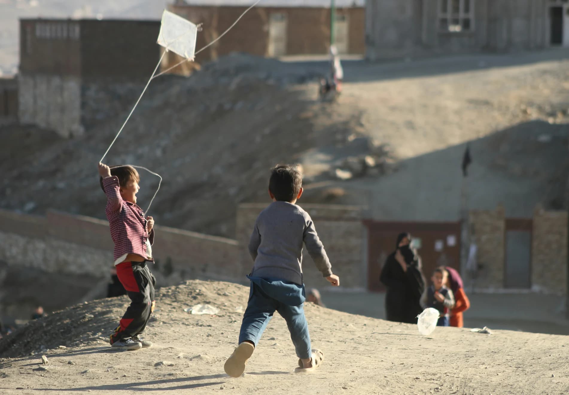 Children flying kites in Afghanistan