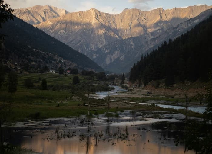 Evening light on the mountains and water near Parun, Nuristan