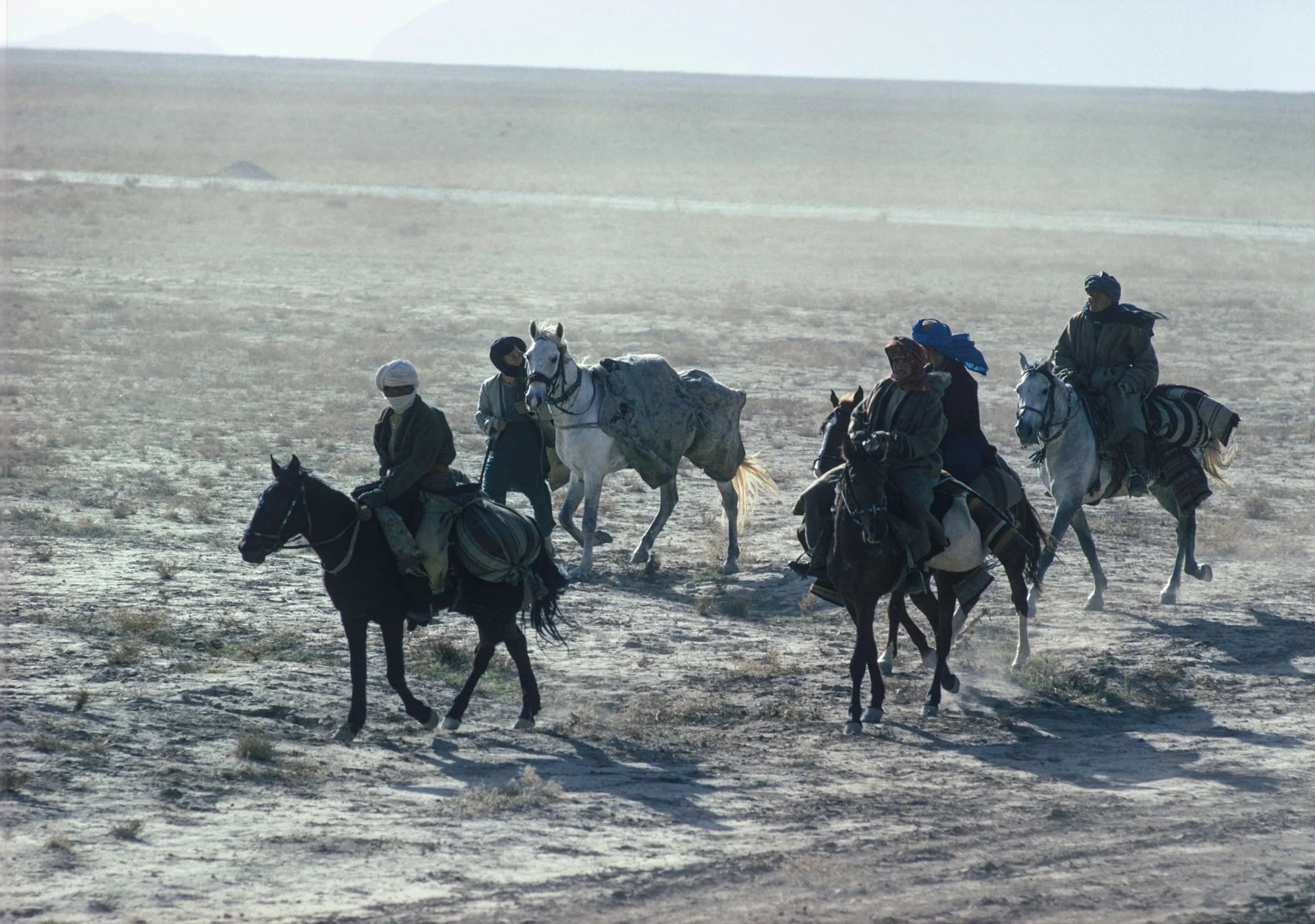 Riders on horseback on the way to market in Aqcha, Jowzjan, 1968