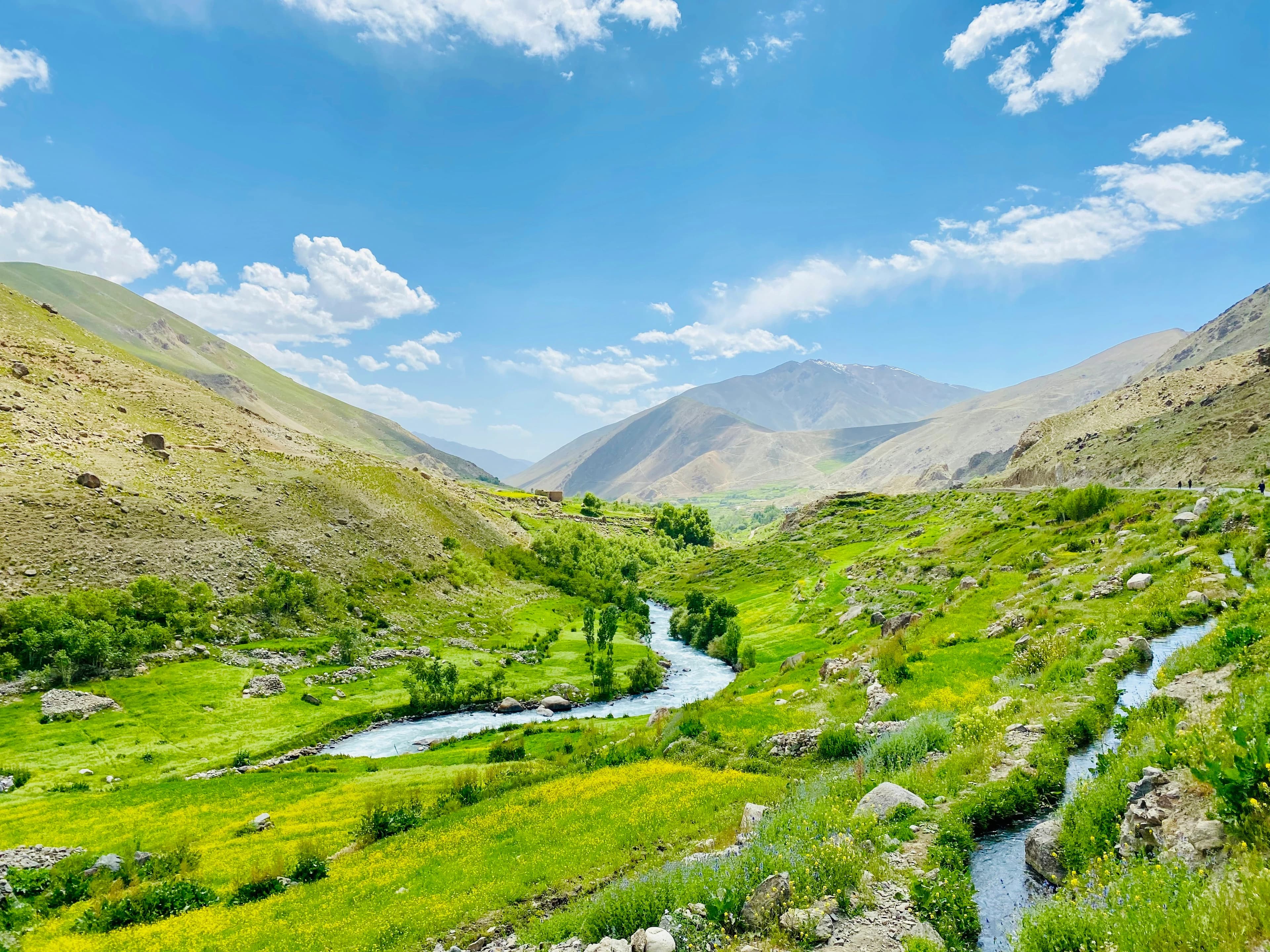 Mountain river and green slopes in Paryan, Panjshir, Afghanistan