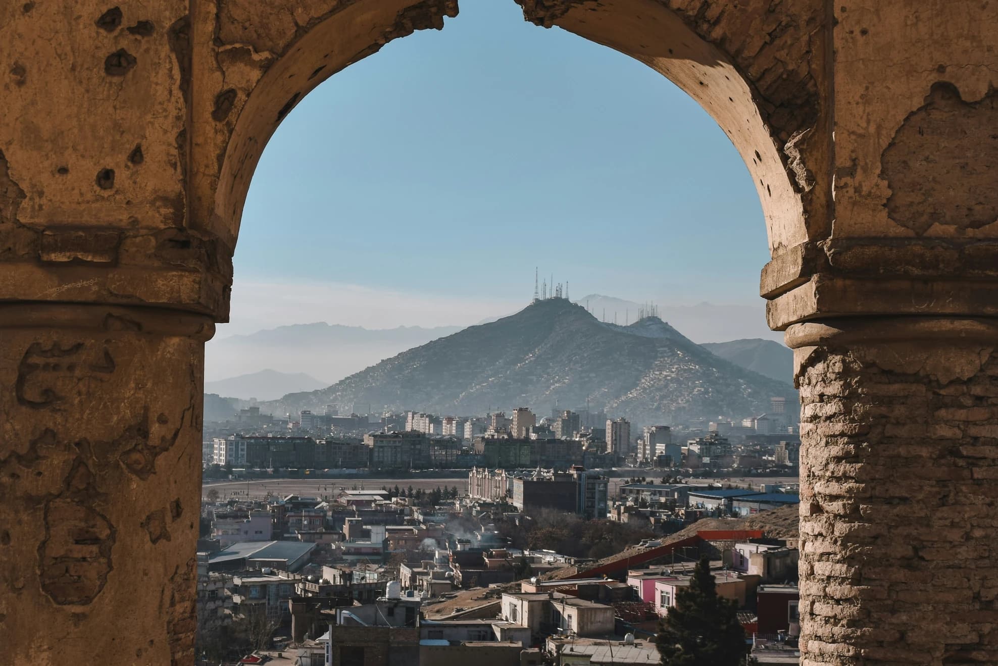 Kabul seen through an arch on Nader Khan Hill