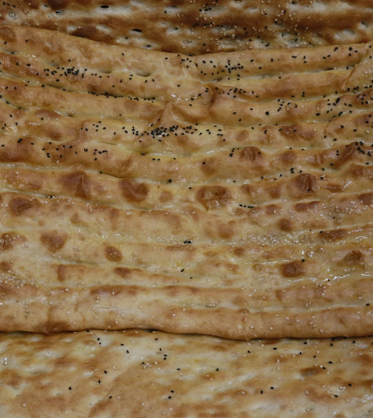 Traditional Afghan flatbread with its patterned surface