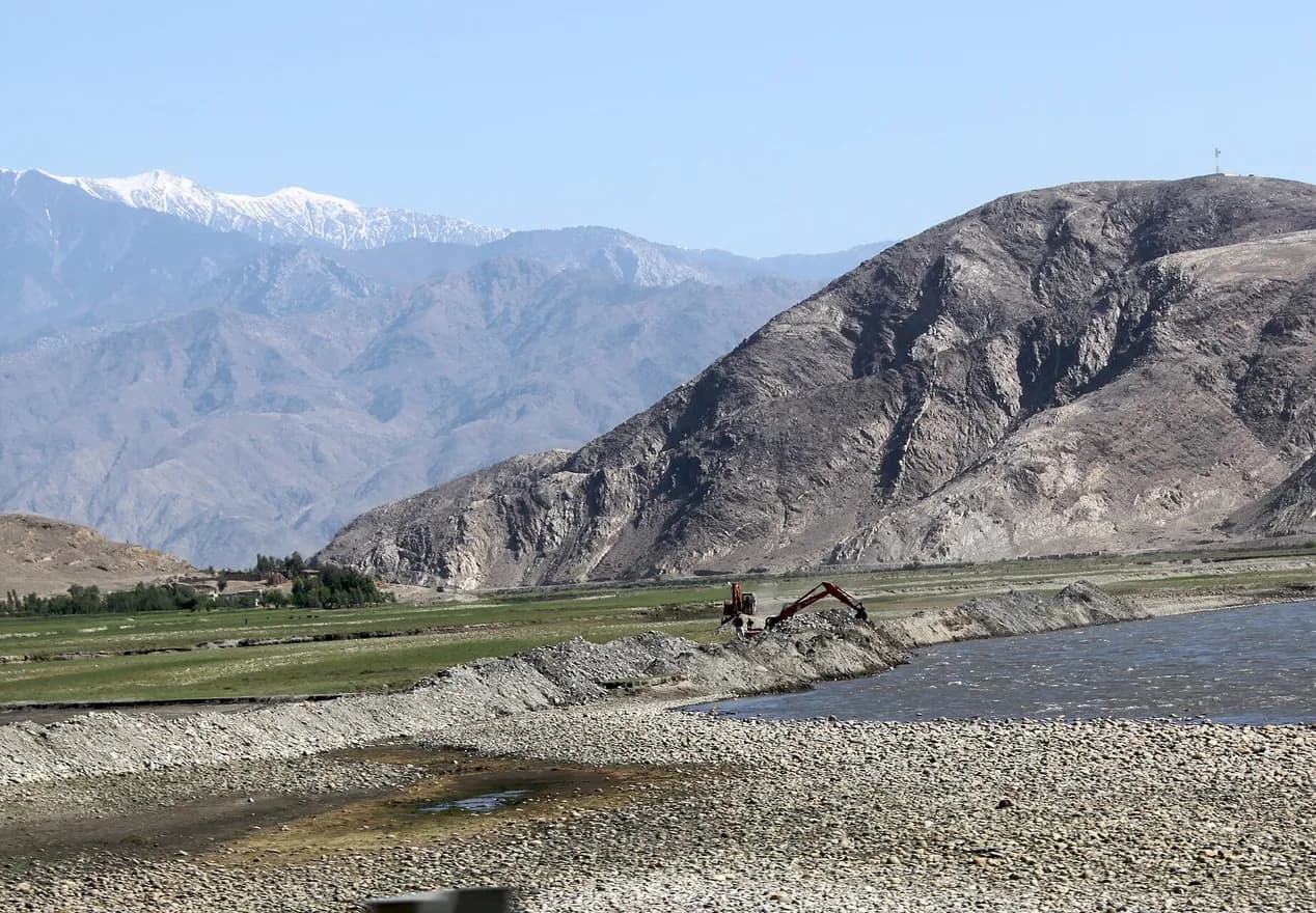 A river valley with green fields along the road from Jalalabad to Dara-i-Nur, Nangarhar, 2010