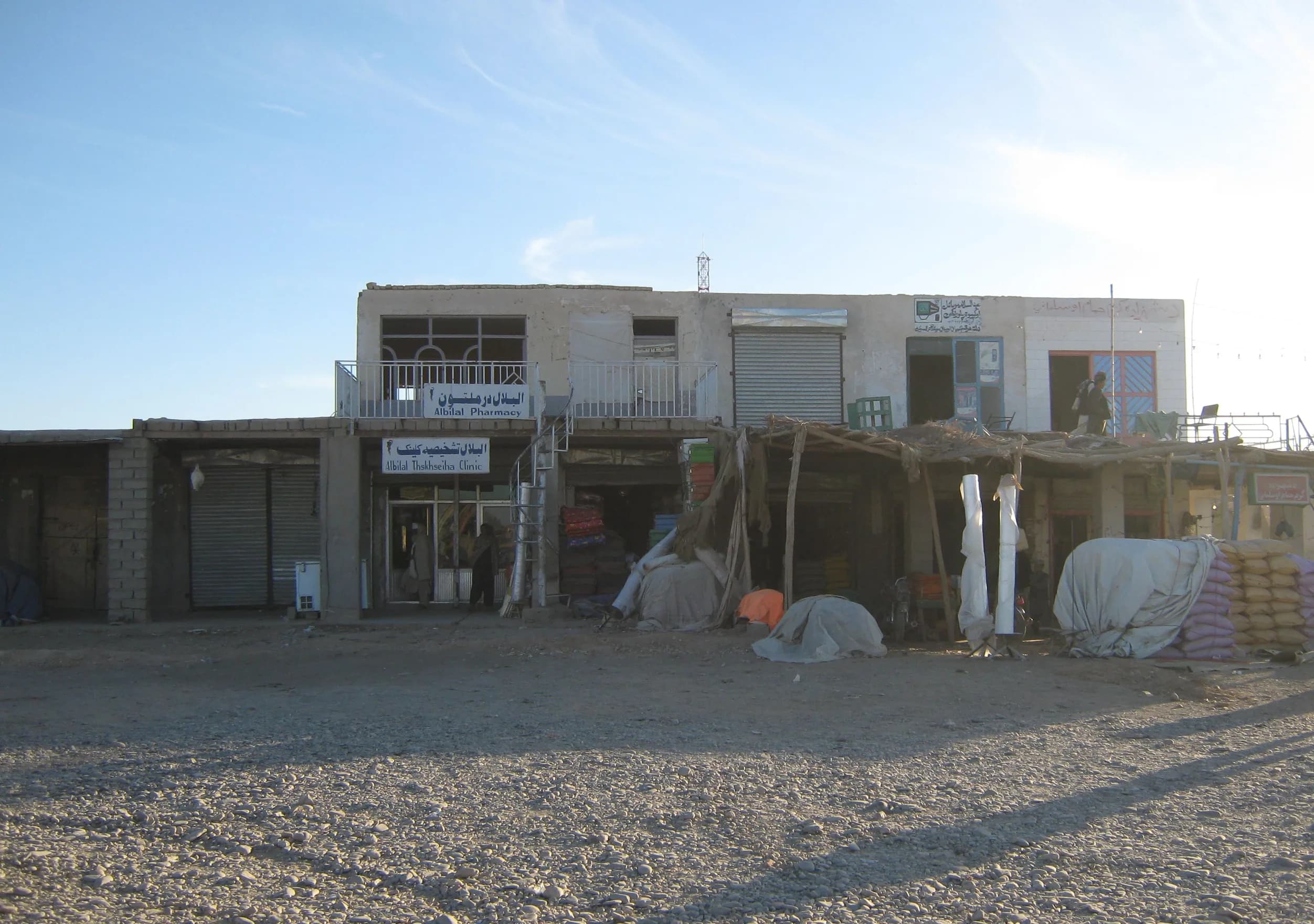 Shops along the Kandahar–Herat Highway at the bazaar in Delaram, Nimroz