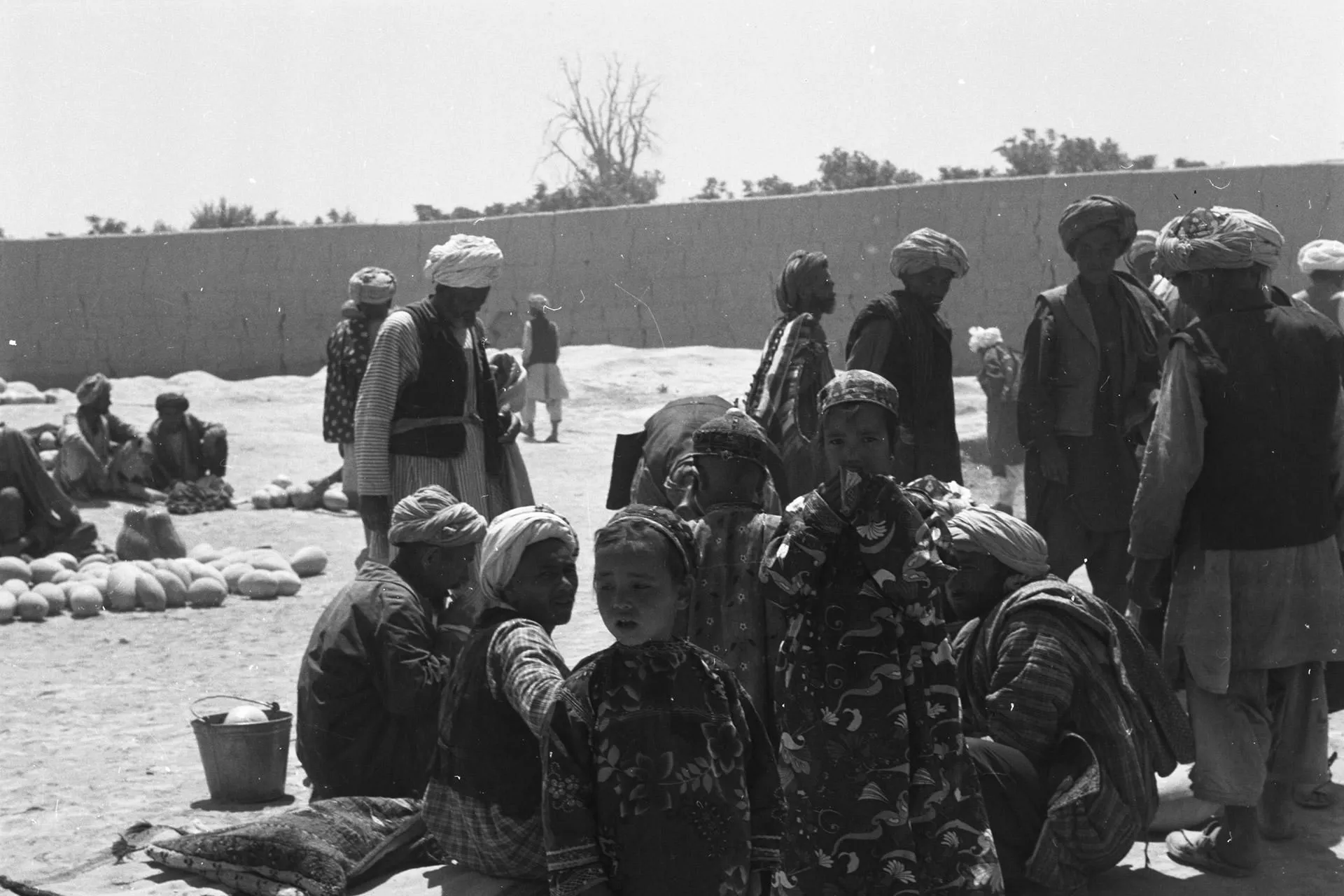 Turkmen girls among shoppers at the bazaar in Dawlatabad, Balkh, 1976