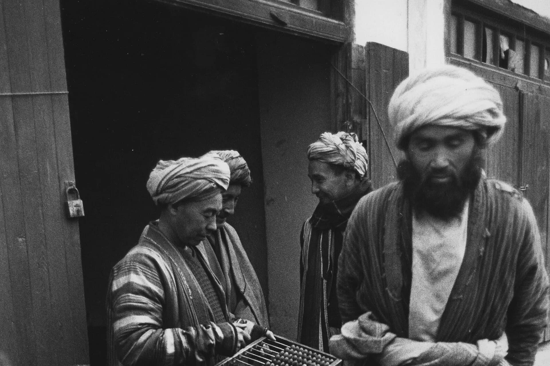Haq-Murat-Bay, a Turkmen landowner, buying carpets at the market in Aqcha, Jowzjan, late 1960s