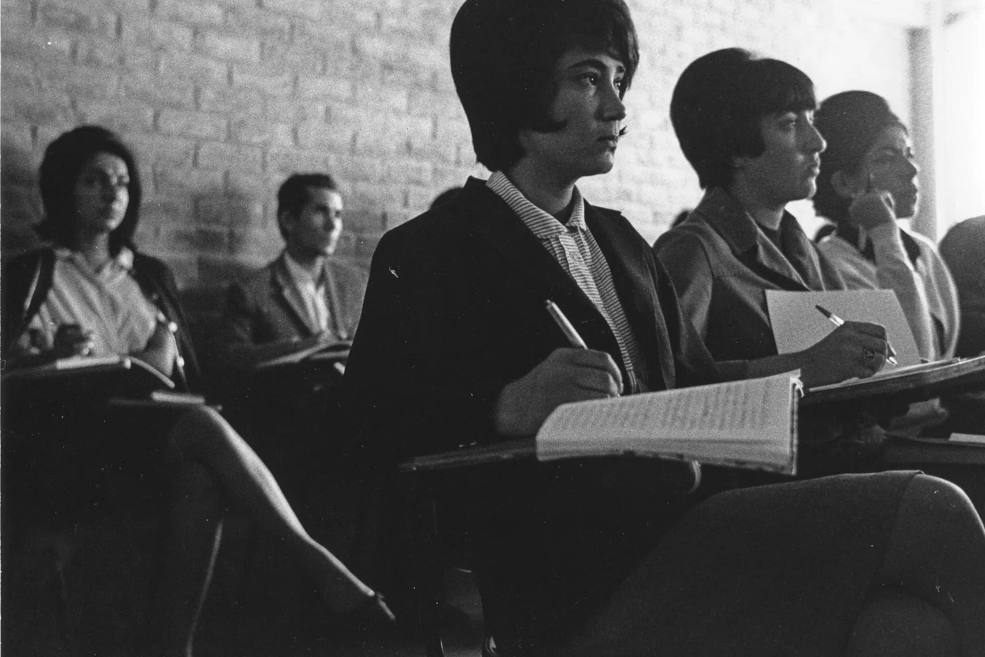 Students taking notes in a classroom at Kabul University, photographed by Herbert Maeder in 1967