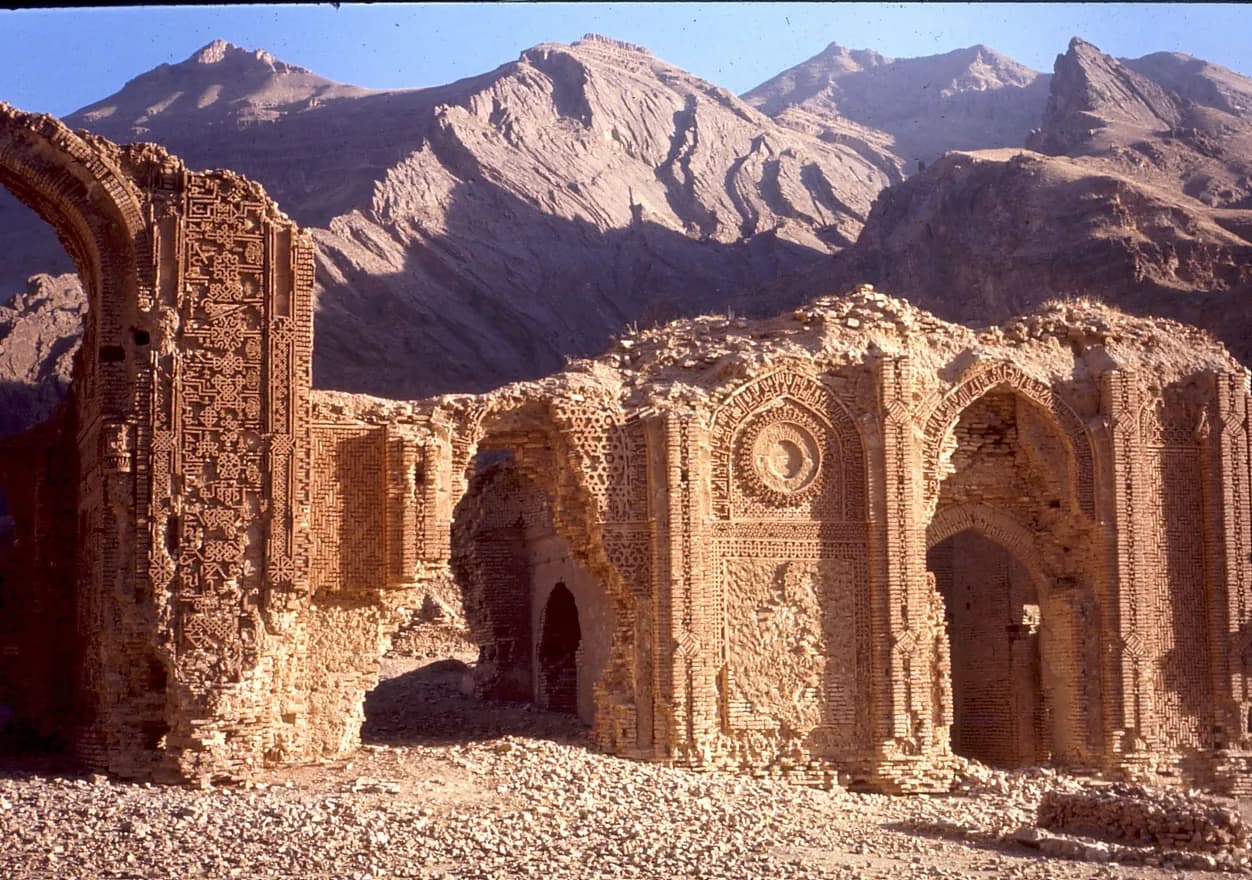 Ruined brick arches of the Shah-i Mashhad madrasa in Badghis Province, 1970