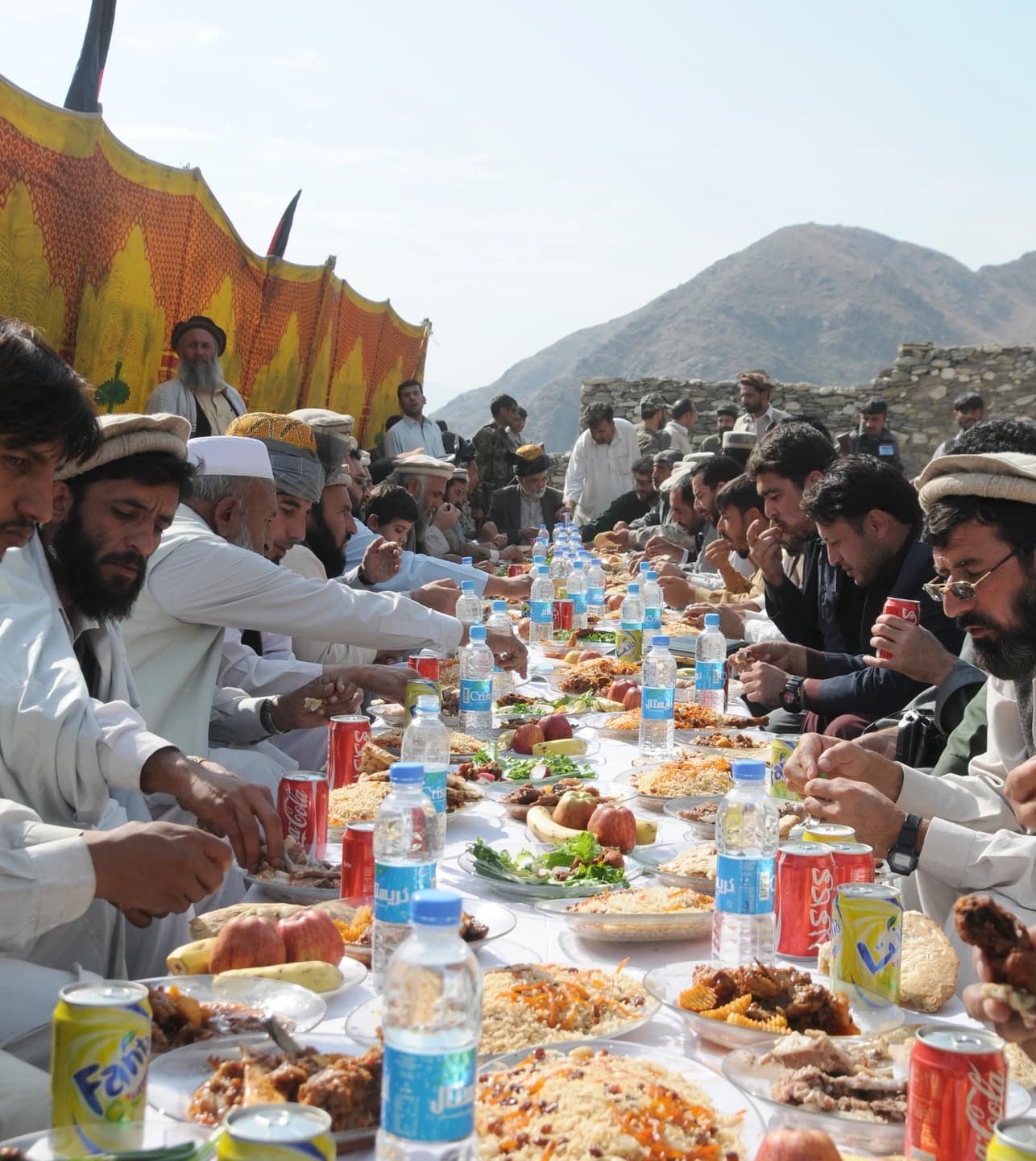 A shared meal celebrating the Khas Kunar bridge opening in November 2009