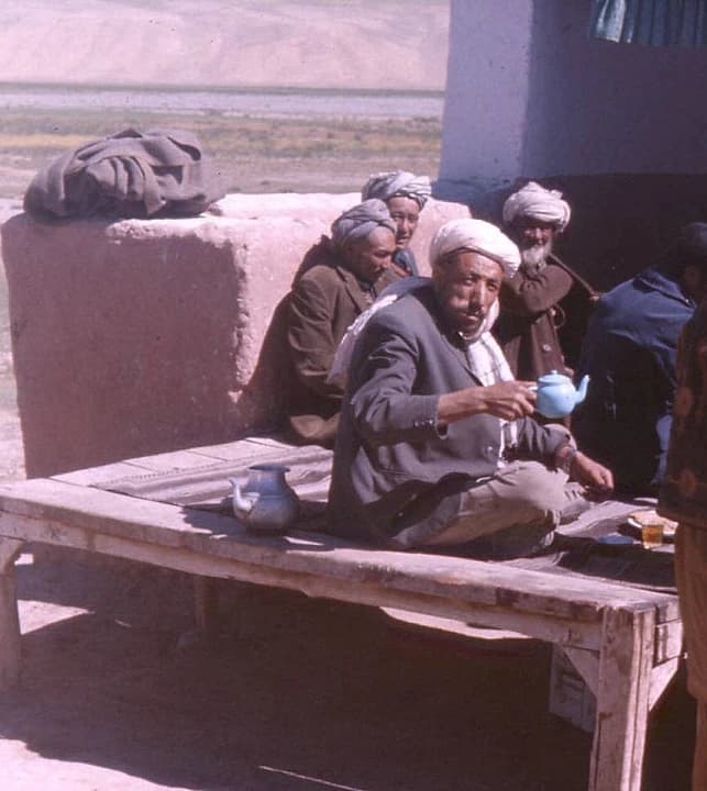 Men sharing tea in Afghanistan, photographed in 1976